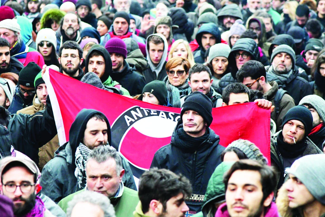 People take part in an anti-racism demonstration in the central Italian town of Macerata, on Feb. 10, one week after an attack that injured at least six migrants.(AFP)