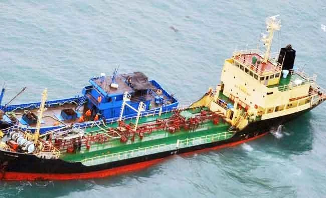 In this Feb. 16, 2018, file photo released by Japan's Ministry of Defense, shows what it says North Korean-flagged tanker Yu Jong 2, bottom, and Min Ning De You 078 lying alongside in the East China Sea. (AP)