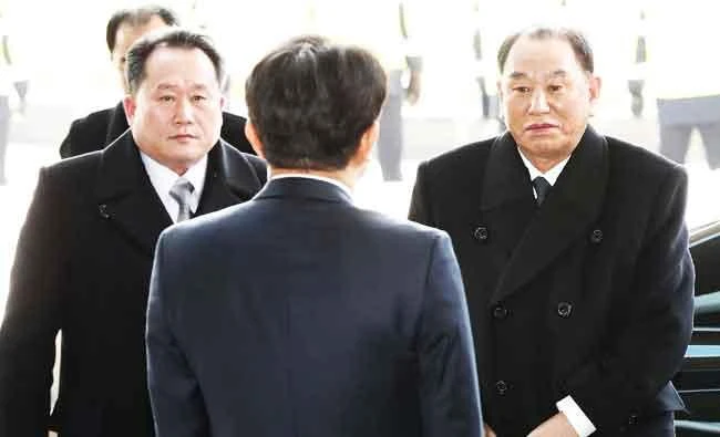 Vice chairman of the North Korean ruling party's central committee Kim Yong Chol and Ri Son-kwon, chairman of the Committee for the Peaceful Reunification of the Fatherland, arrive at their hotel in Seoul, South Korea, on Sunday. (REUTERS)