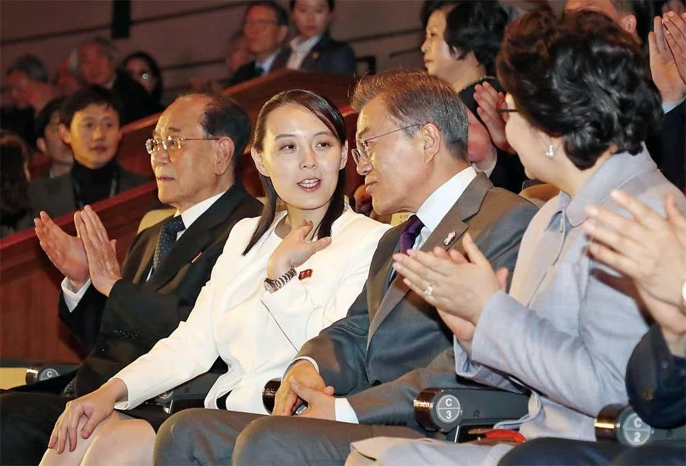 Kim Yo Jong, the sister of North Korean leader Kim Jong Un, talks with South Korean President Moon Jae-in during a Pyongyang Samjiyon Orchestra concert in Seoul. (AFP)