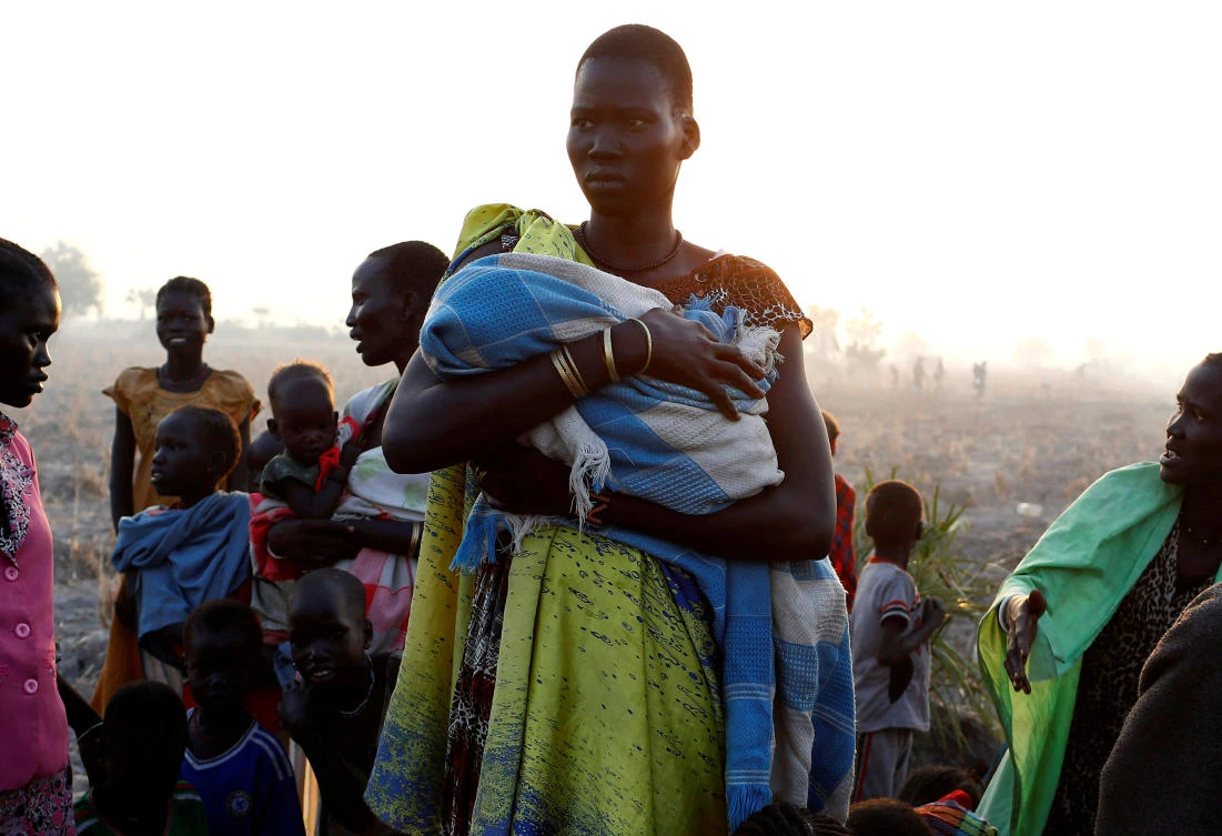 A woman waits to be registered prior to a food distribution carried out by the United Nations World Food Programme (WFP) in Thonyor, Leer state, South Sudan. Nearly half of the South Sudanese population is facing acute food insecurity. (Reuters)