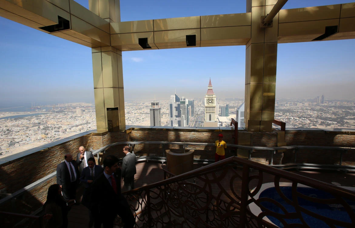 Visitors are seen at the 71st floor of the Gevora Hotel, the world's tallest hotel, in Dubai. The emirate remains the dominant regional market for luxury hotels, but Saudi Arabia is catching up, according to hospitality analysts. (Reuters)