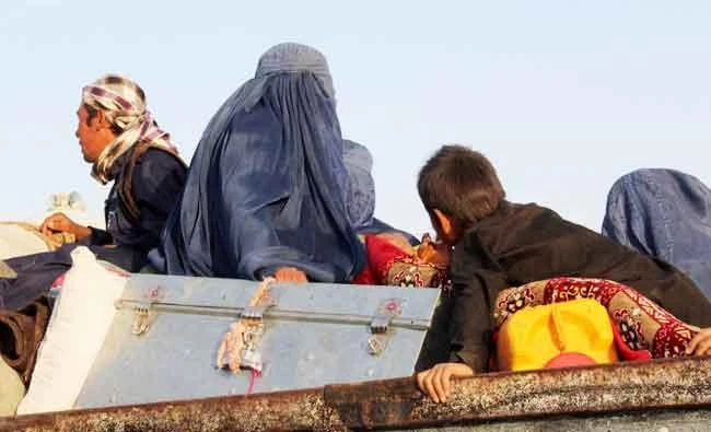 Afghan villagers sit on the top of a vehicle as they leave after being released by insurgents in the northern province of Sar-e Pul, in this August 9, 2017 file photo. (AFP)