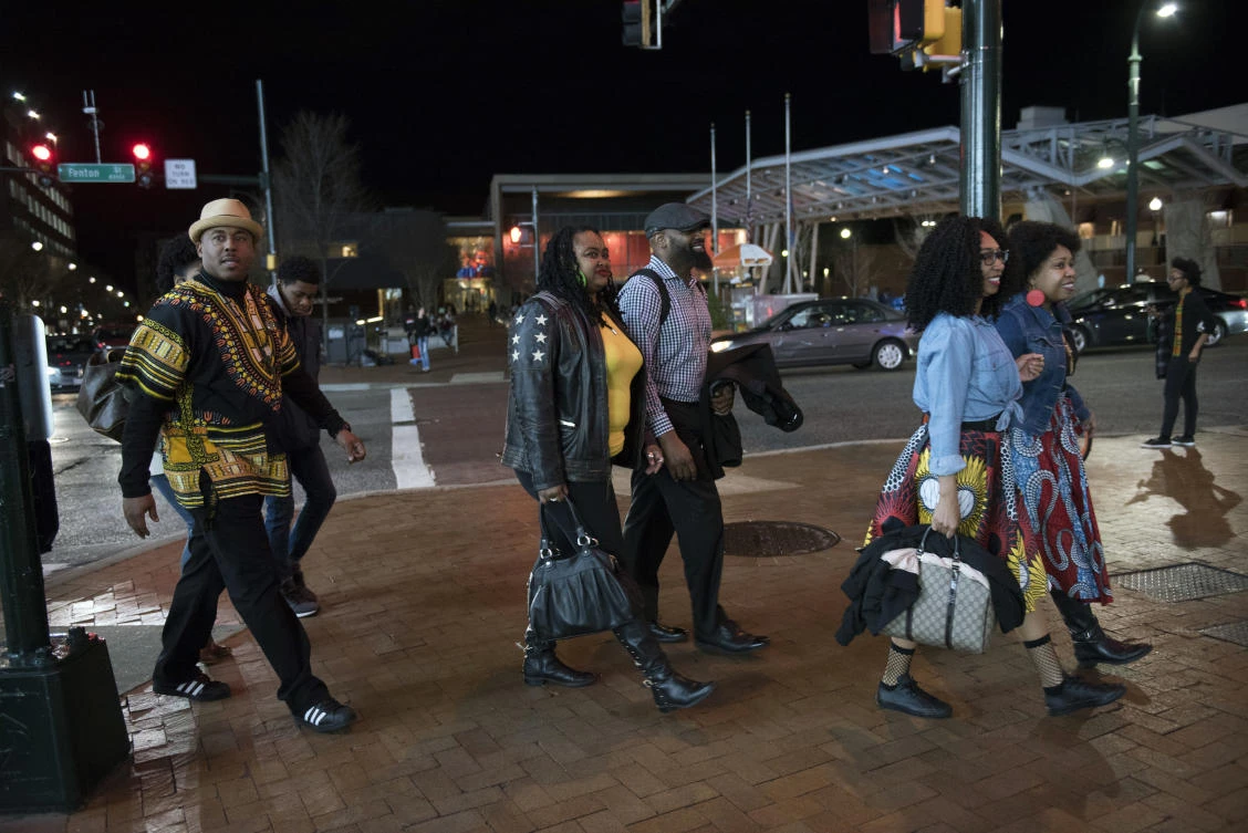In this Feb. 15, 2018, file photo, Emanuel Lawton, left, and his family dressed in Wakanda-inspired attire arrive to see Black Panther in Silver Spring, Md. (AP)