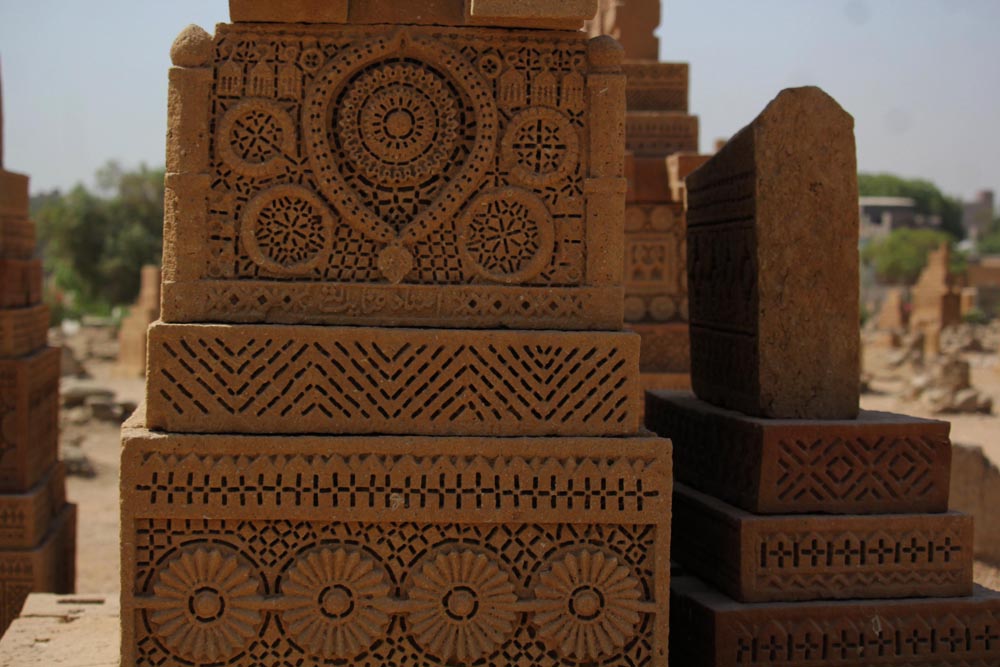 The caretaker says this tomb belongs to a woman because it has design of jewelry on it (Photo Arab News/ M.F. Sabir)