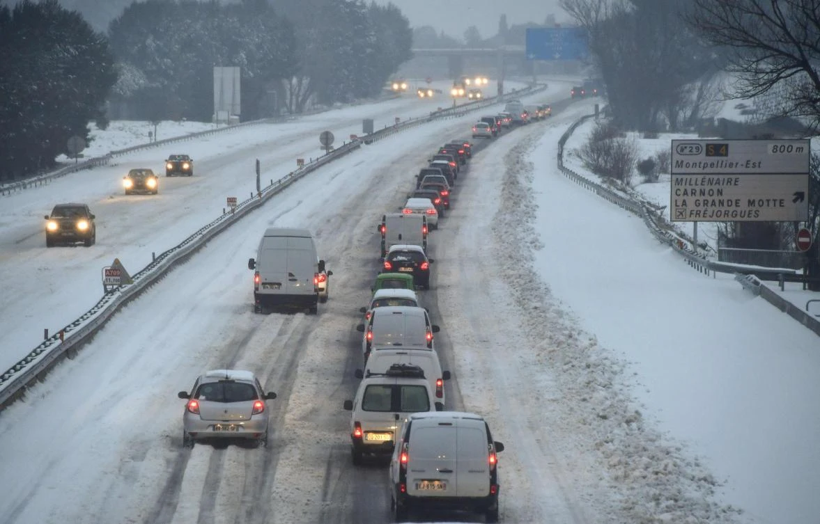Traffic in the snow on the A9 motorway near Montpellier in the south of France. (AFP)