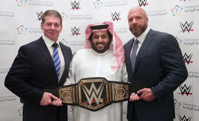 Saudi sports chief Turki Al-Sheikh with the WWE's Vince McMahn (L) and Triple H. (SPA)
