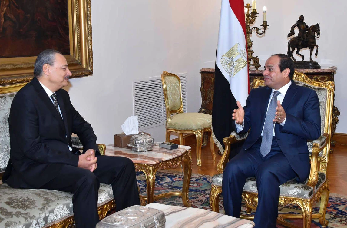 Egyptian President Abdel Fattah El-Sisi (R) meeting with Nabil Sadeq after he was sworn in as Egypt’s new Attorney General. (File Photo: AFP)