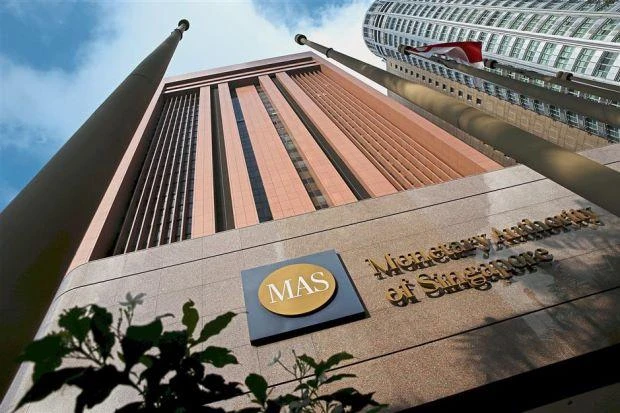 The Monetary Authority of Singapore is assessing if additional regulations are required to protect cryptocurrency investors. (Reuters)