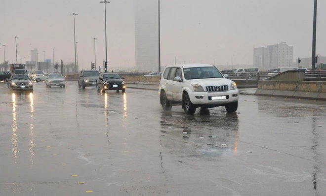 File Photo showing cars in the rain in the Saudi capital Riyadh