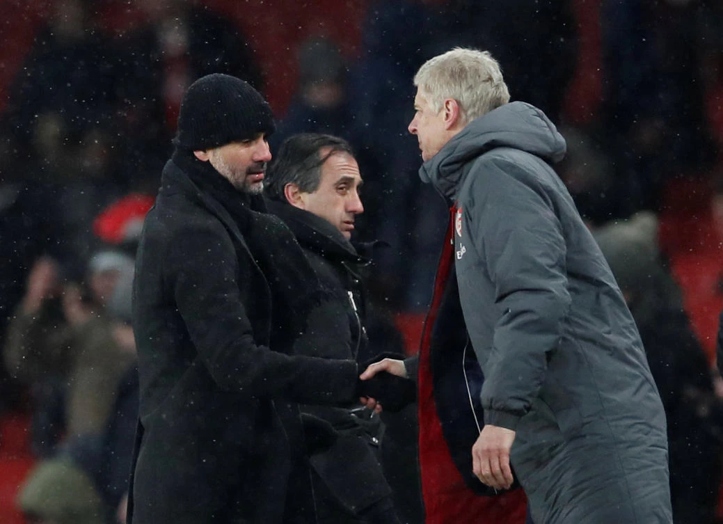 Pep Guardiola had some words of comfort for his old adversary Arsene Wenger. (Reuters)