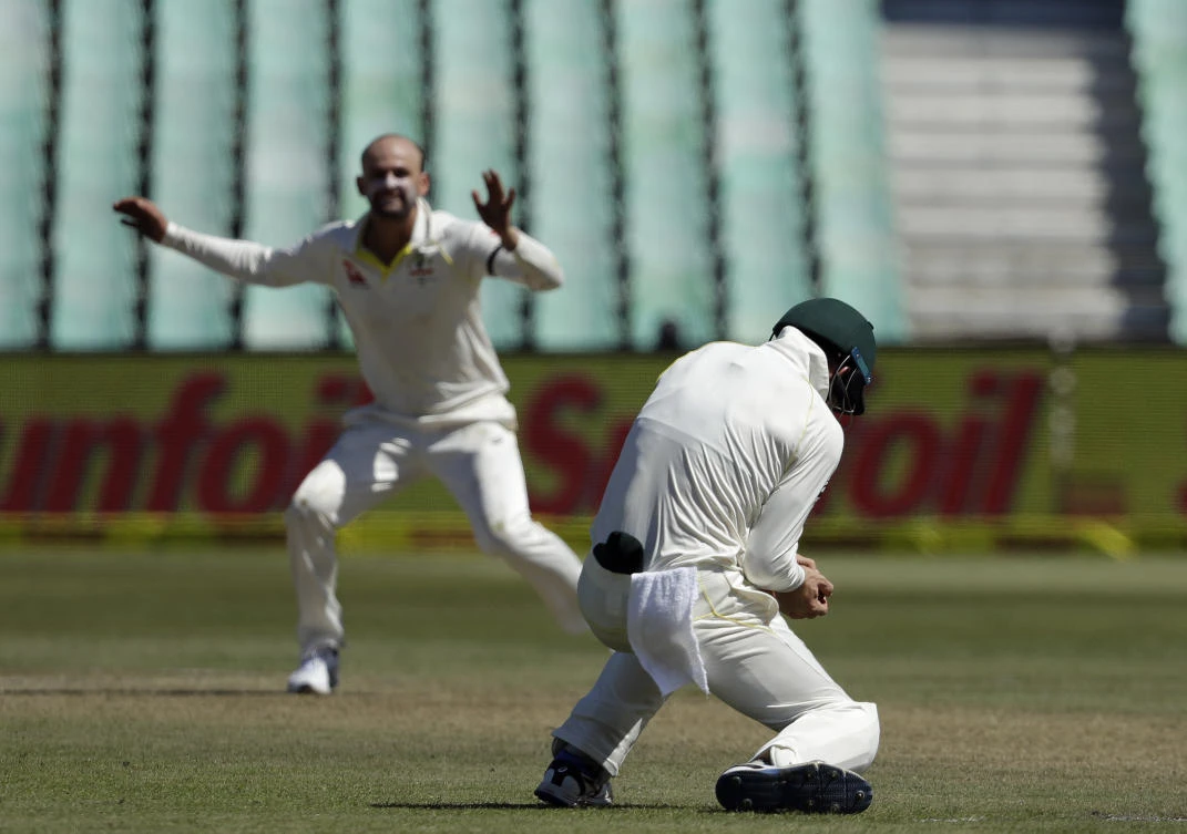 Australia's Cameron Bancroft takes a catch to dismiss South Africa's batsman Hashim Amla off the bowling of Nathan Lyon. (AP)