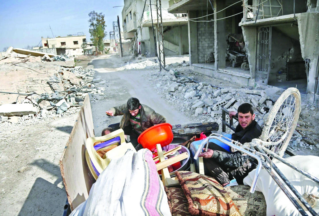 Eastern Ghouta’s 400,000 residents have lived under regime siege since 2013, facing severe food and medicine shortages even before the latest offensive. (AFP)