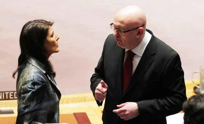 US United Nations ambassador Nikki Haley speaks with Russian ambassador to the UN Vasily Nebenzya before a meeting of the UN Security Council at UN headquarters in New York, U.S., in this February 20, 2018 photo. (REUTERS)