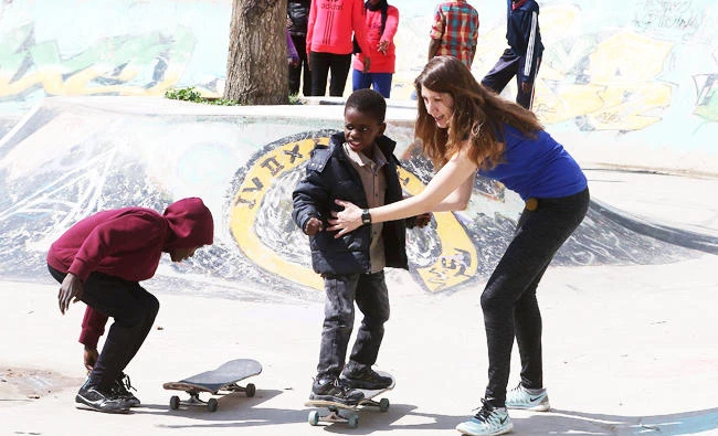 Refugee children skate on February 24, 2018 at the "7Hills Skate Park" in Amman, that was constructed in 2014 by passionate skateboarding volunteers from all over the world thanks to an initiative launched by a German NGO and a local Jordanian association which offers free skateboarding lessons to refugees several times a week. (AFP)