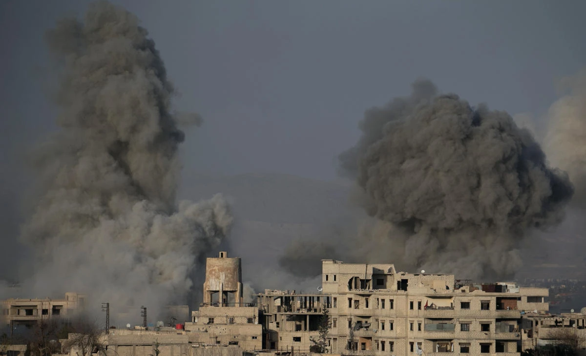 Smoke billows following Syrian government bombardments on the besieged rebel-held town of Hamouria in the eastern Ghouta region on the outskirts of the capital Damascus on March 3, 2018. (AFP)