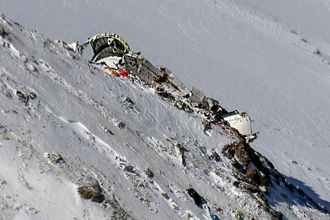 Rescue teams recover black boxes at site of Iran plane crash