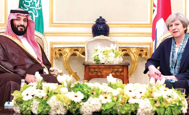 Crown Prince Mohammed bin Salman, left, with British Prime Minister Theresa May in Riyadh. (SPA/file)