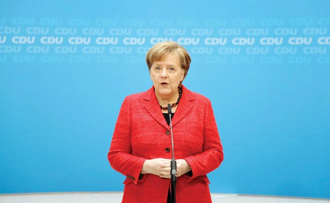 Merkel vows swift return to government work to boost Europe