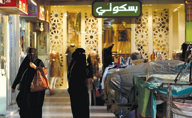 Shoppers at a Riyadh market. Business conditions are improving in Saudi Arabia, according to the latest PMI survey. (Reuters)