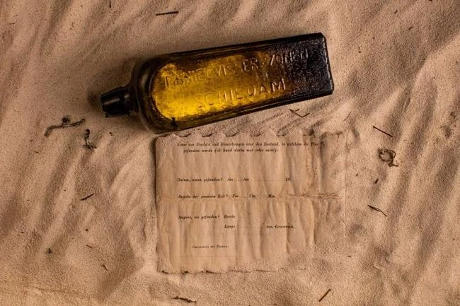 The world's oldest-known message in a bottle — a form filled out as part of a German experiment to understand ocean currents — was found on a west Australian beach. Courtesy Kym Illman