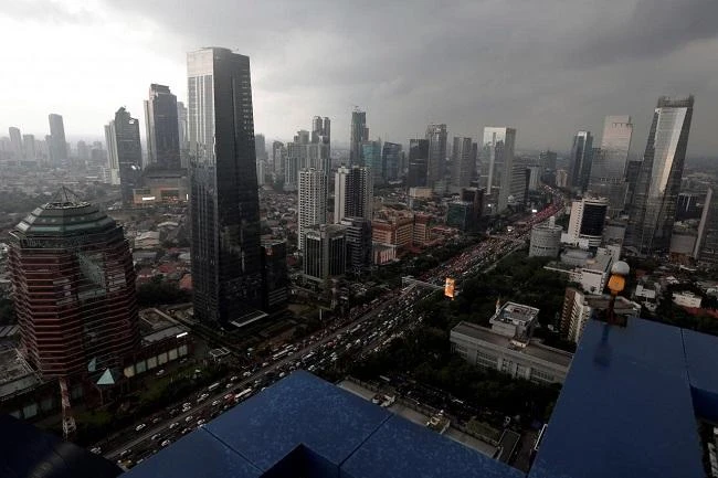All companies, foundations, limited partnerships and other types of corporations must disclose at least one person as their beneficial owner upon registering for business, the new Indonesia regulation says. Above, the central business district of Sudirman. (Reuters)