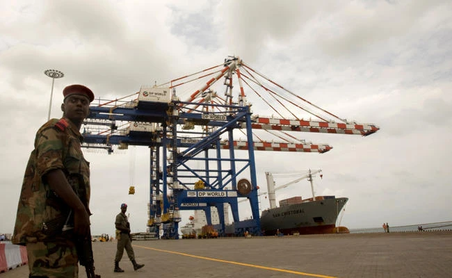 A Djibouti policeman stands guard during the opening ceremony of Dubai-based port operator DP World's Doraleh container terminal in Djibouti port in this February 7, 2009 photo. (REUTERS file)