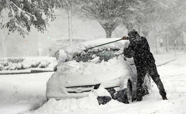 Northeast US tries to dig out, power up after latest storm