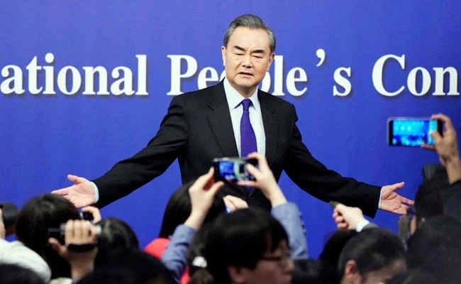 China's Foreign Minister Wang Yi speaks to the media after a news conference during the National People's Congress (NPC), China's parliamentary body, in Beijing on Thursday. (Reuters)