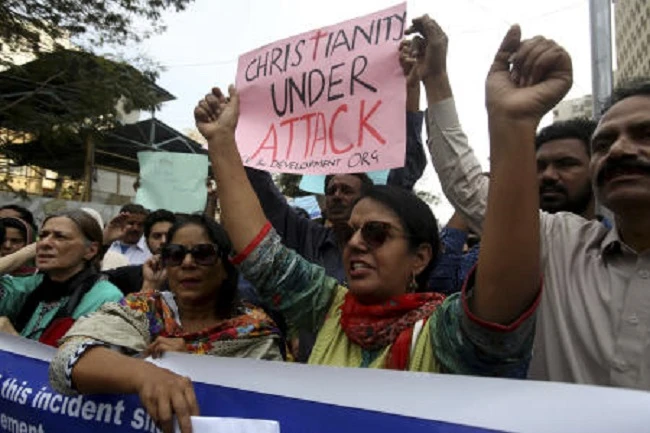 Pakistani civil society activists protest against the blasphemy law, which they claim terrifies minorities, quashes dissent and emboldens radicals who use it to whip up extremism in the population and threaten those who oppose them. (AP)