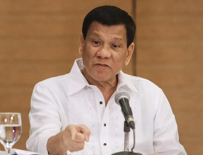 Philippine President Rodrigo Duterte gestures as he speaks during a press conference in Davao City, in the southern island of Mindanao on February 9, 2018. (AFP)