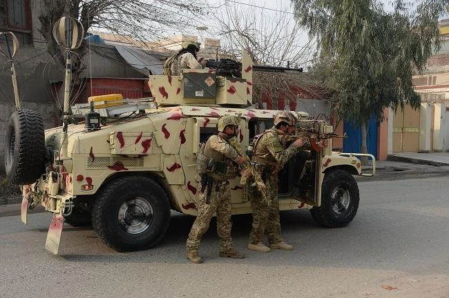 As many as 18 Afghan soldiers killed fighting in western province. (AFP)