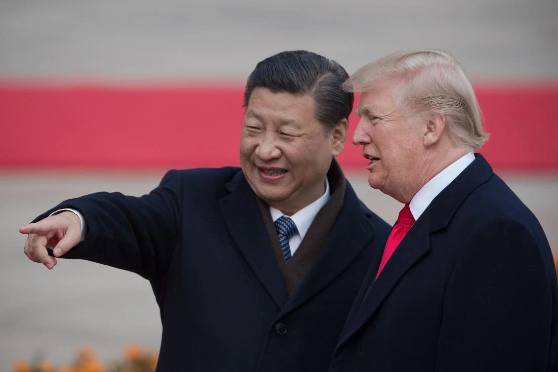In this file photo taken on Nov 8, 2017 China’s President Xi Jinping and US President Donald Trump attend a welcome ceremony at the Great Hall of the People in Beijing. (AFP)