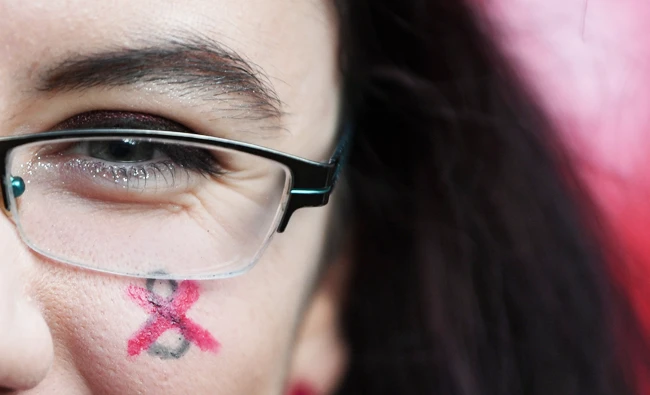 A demonstrator shows a symbol for Repeal the 8th Amendment painted on her face during a march for more liberal Irish abortion laws, in Dublin, Ireland, in this March 8, 2018 photo. (REUTERS)