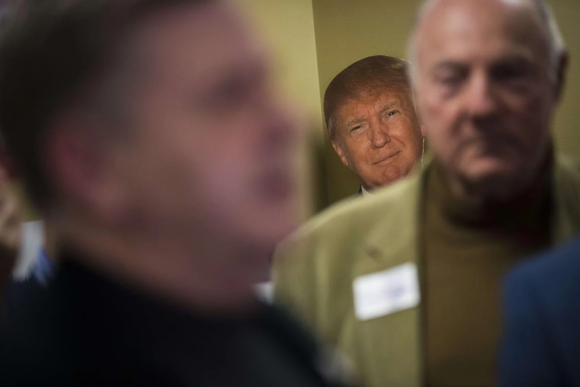 A cardboard cutout of President Donald Trump sits against the wall as Rick Saccone, Republican Congressional candidate for Pennsylvania’s 18th district, speaks to reporters at the Republican Committee of Allegheny County offices, March 9, 2018 in Pittsburgh, Pennsylvania. (AFP)