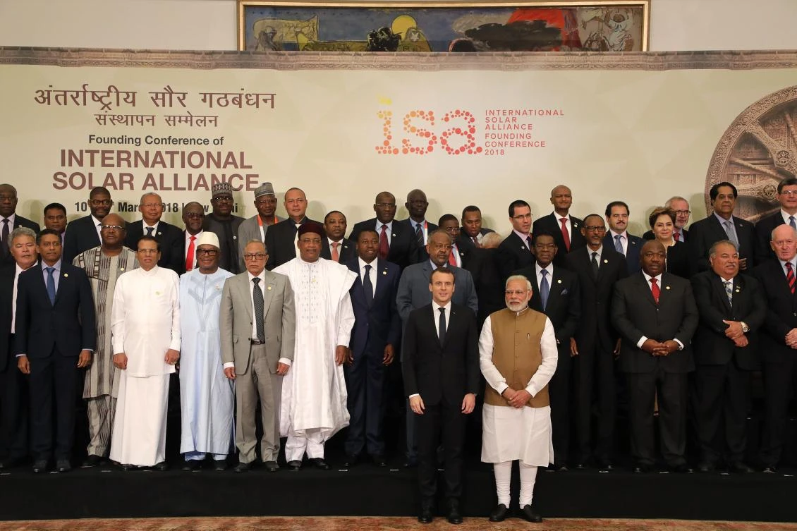 Indian Prime Minister Narendra Modi (front R) and French President Emmanuel Macron (front L) pose with world leaders and representatives for a group picture at the start of the founding conference of the International Solar Alliance in New Delhi. (AFP)