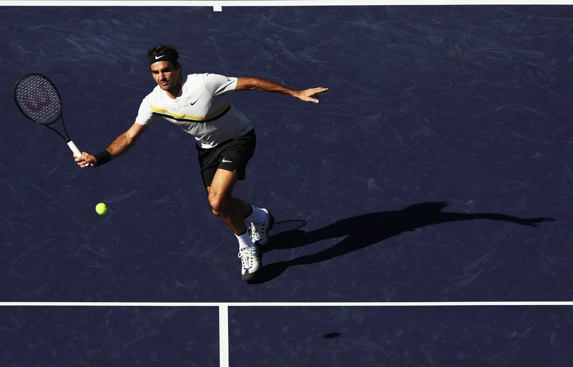 Roger Federer of Switzerland hits a shot during his match against Federico Delbonis of Argentina during the BNP Paribas Open at the Indian Wells Tennis Garden of the Czech Republic on March 11, 2018 in Indian Wells, California. (AFP)
