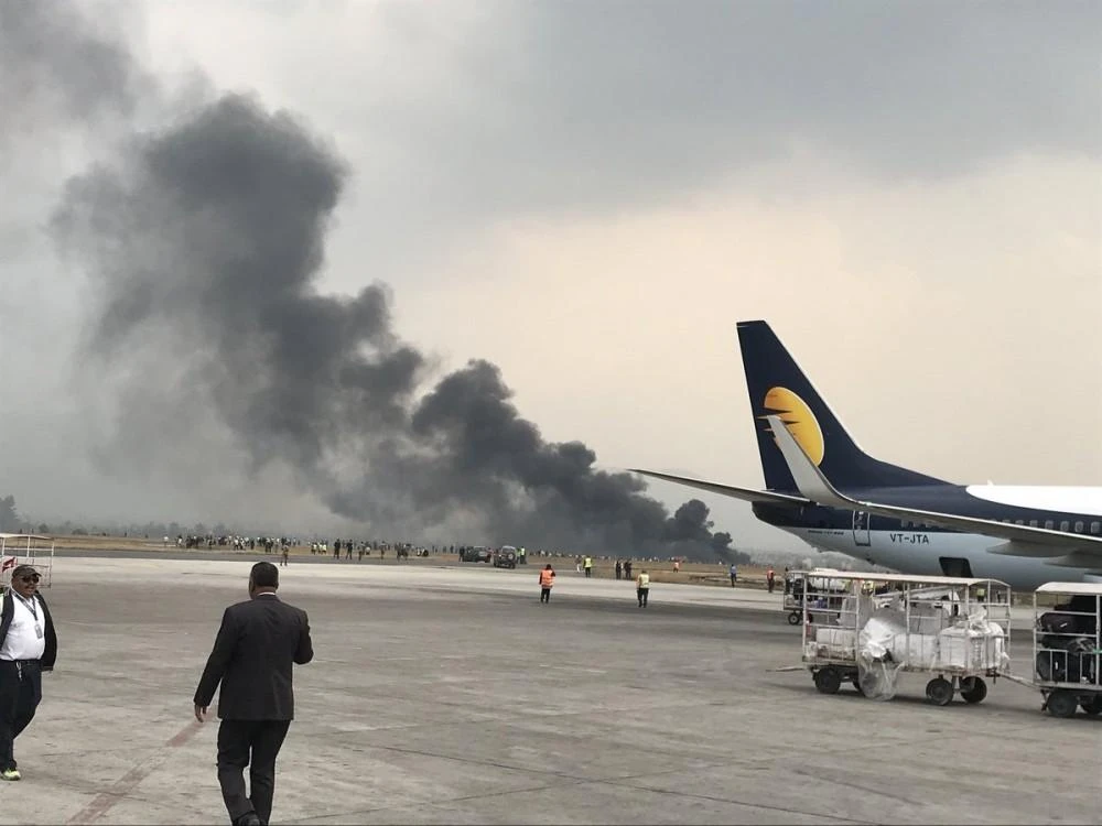 US-Bangla airlines aircraft crashed at Tribhuvan International Airport. (Twitter/Bishnu Sapkota)