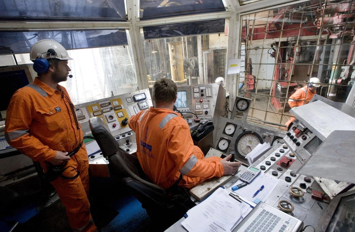 Workers stand in a control room of the Sleipner gas platform, some 250 km off Norway’s coast in the North Sea. (File Photo: AFP)