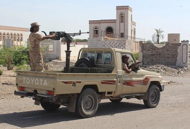 Forces loyal to the Saudi-backed Yemeni president patrol a street in the southern city of Lahj. (AFP)