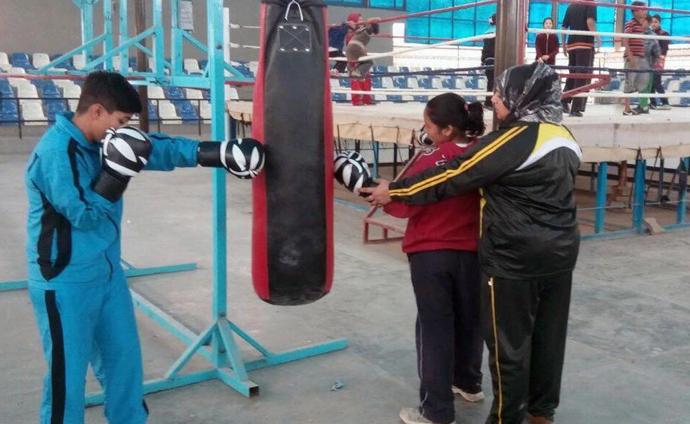 Boxing coach Shehnaz Kamal training her students boxing at a class in her home in Peshawar. (AN photo by Shahid Shalmani)