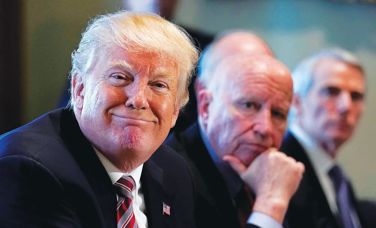 US President Donald Trump holds a meeting on trade with members of Congress at the White House after introducing tariffs on steel and aluminum imports. His action is expected to lead to retaliatory moves from Europe and elsewhere. (Reuters)