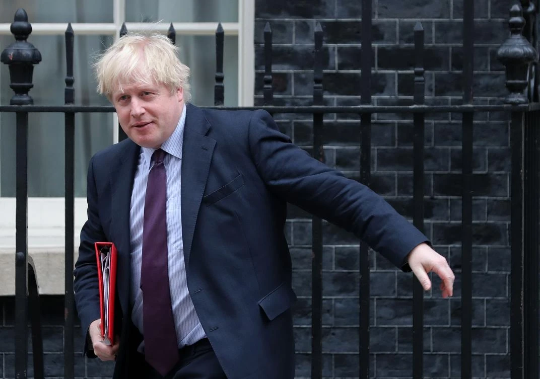 Britain’s Foreign Secretary Boris Johnson leaves 10 Downing Street in central London on Tuesday after attending the weekly meeting of the Cabinet. (AFP)