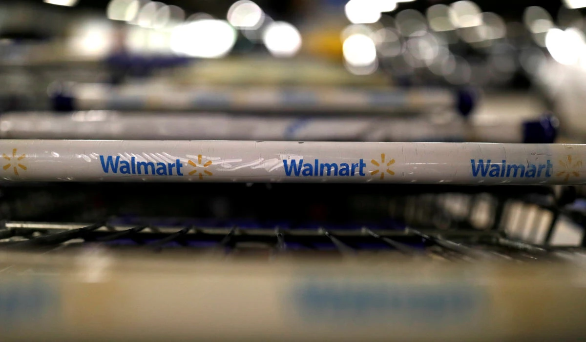 Online revenue growth slowed at Walmart in the most recent quarter, causing some analysts to question its strategy to compete with Amazon. (Reuters)
