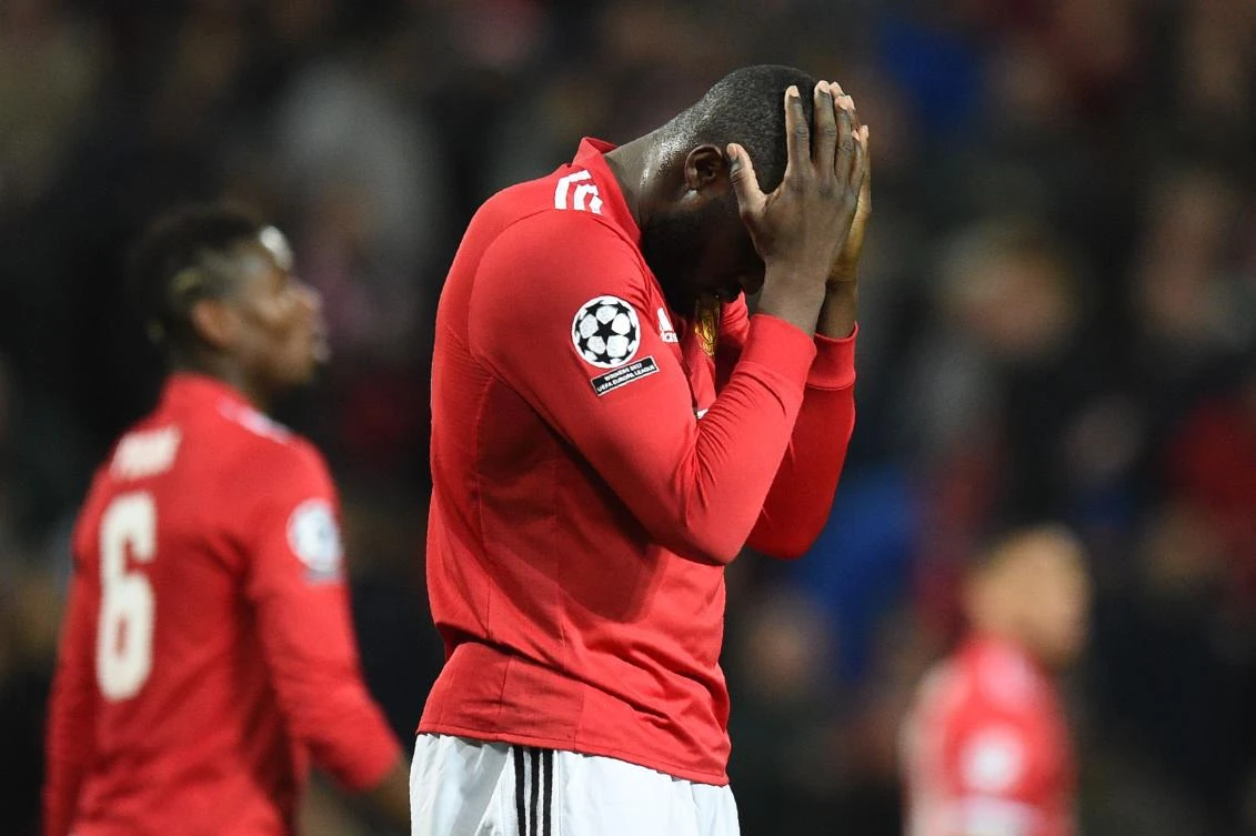 Manchester United's Belgian striker Romelu Lukaku reacts after missing a shot during his side's defeat to Sevilla in the Champions League. (AFP)