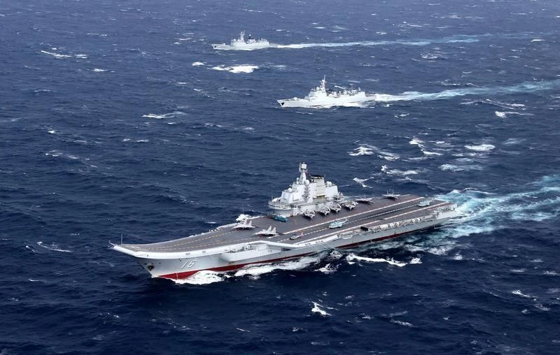 China claims most of the South China Sea, and has been building artificial islands on reefs, some with ports and air strips, developments that have irked ASEAN members. Above, China’s Liaoning aircraft carrier with accompanying fleet conducts a drill in an area of South China Sea. (Reuters)