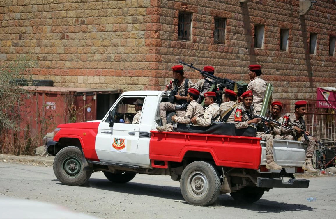 Yemeni military policemen patrol the streets of the city of Taez, on March 13, 2018. (AFP)