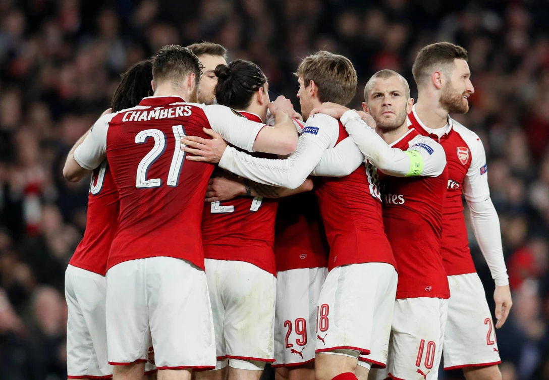 Arsenal's Granit Xhaka celebrates scoring their second goal with teammates (Reuters)