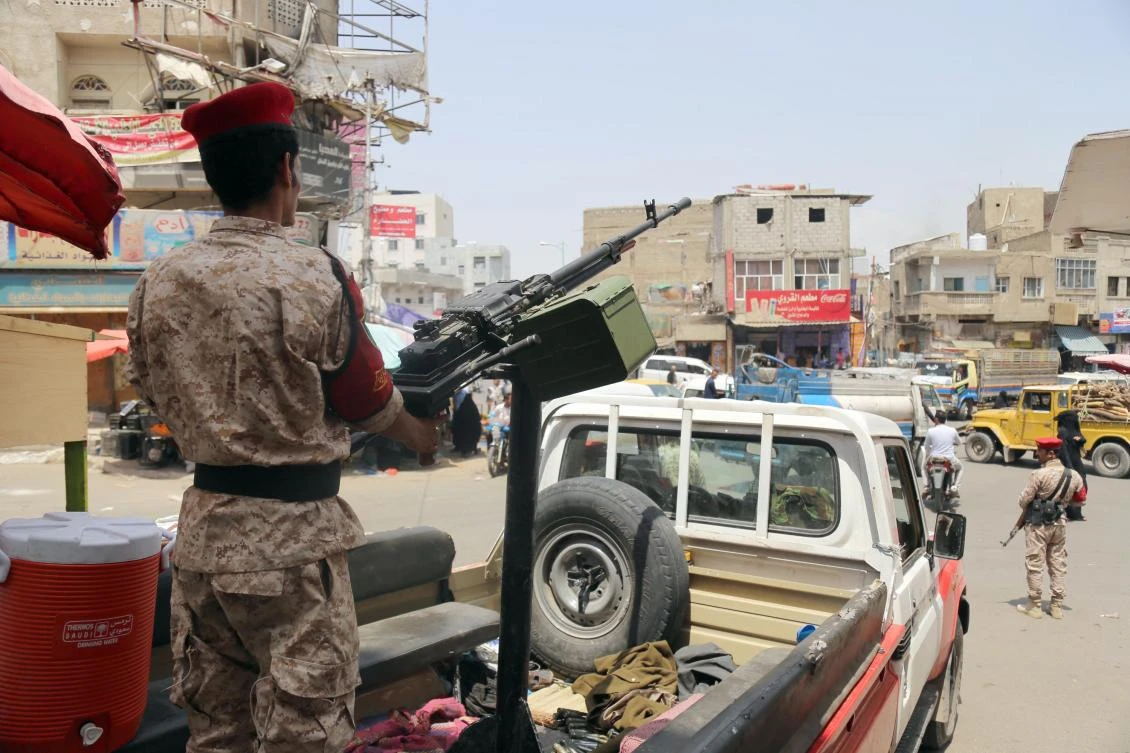 Yemeni military policemen patrol the streets of the city of Taiz, on March 13, 2018. (AFP)