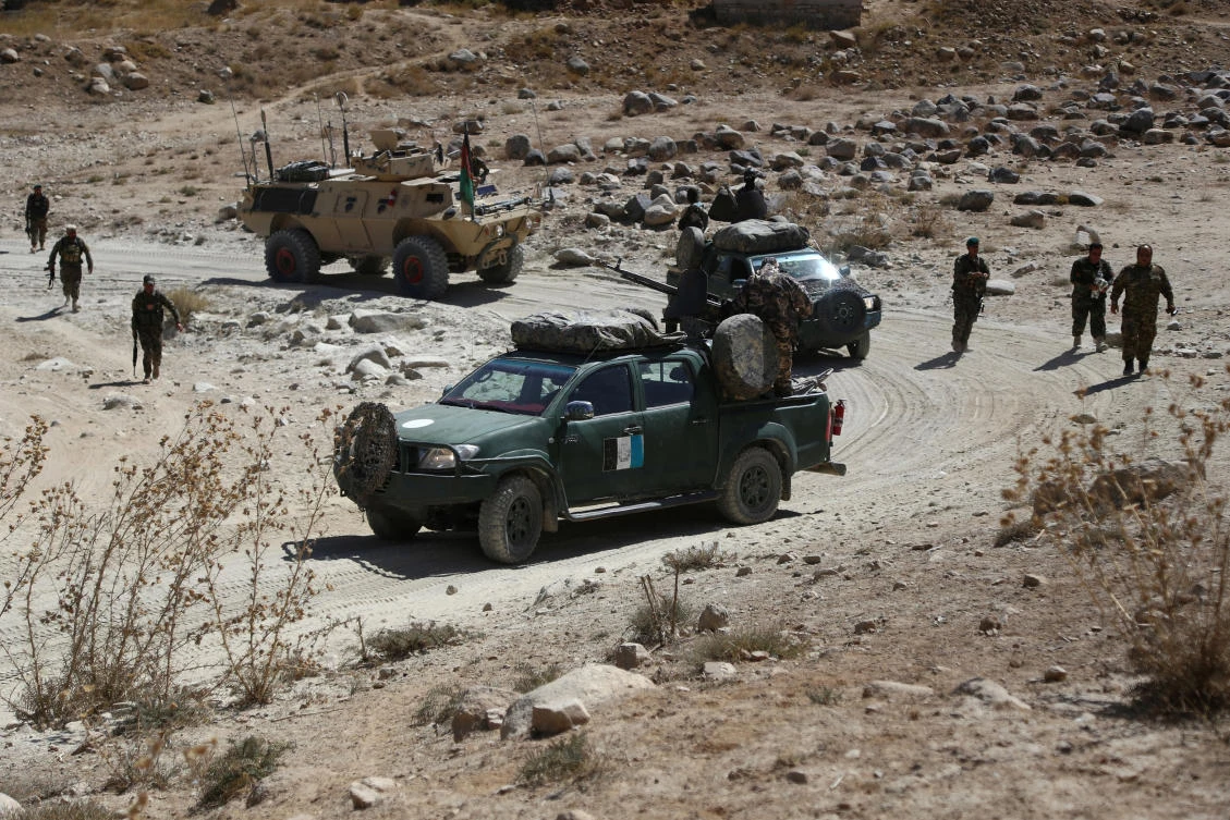 In this file photograph Afghan security personnel take part in a patrol during an operation against Taliban militants in the Jaghatu District of Ghazni Province. (Zakeria Hashimi/AFP)